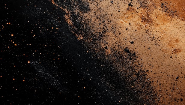 Abstract explosion of dark and light brown particles on a black background photo
