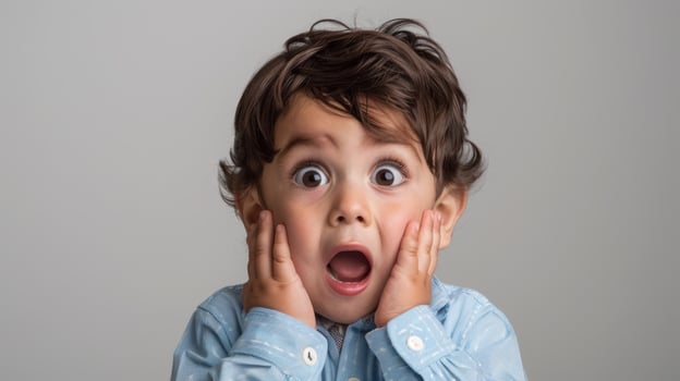 The surprised young boy. photo