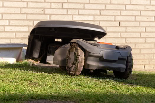 Robotic lawn mower returns to charging station photo