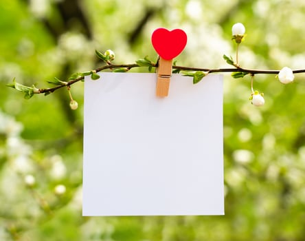 Card for Mother's Day and Valentine's day with a message with a heart. Mockup. Spring composition. Copy space. photo