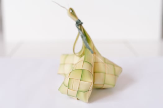 Ketupat traditional rice dumpling Indonesian and Malaysian cuisine photo