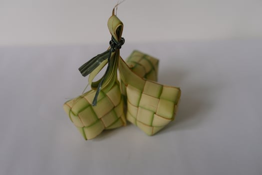 Ketupat traditional rice dumpling cuisine for Eid al-Fitr celebration photo