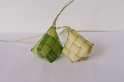 Freshly Made Ketupat Rice Dumplings Showcase Traditional Weaving Style photo