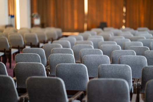 Empty Conference Hall with Rows of Chairs photo