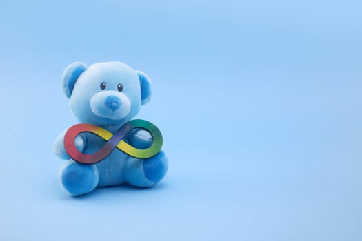 Teddy with Infinity symbol. Autism awareness. Neurodiversity awareness and acceptance photo