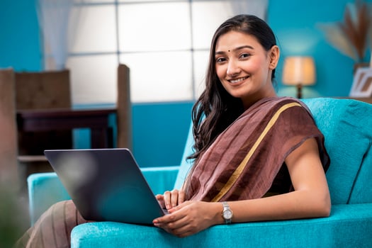 Indian Hot Housewife Posing While Working At Laptop photo