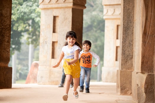 Nice Kids Playing And Having Fun On Sunny Summer Day In Casual Clothes photo