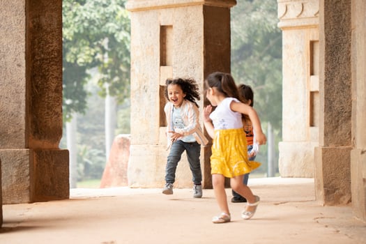 Sweet Kids In Casual Clothes Running In Race And Laughing photo