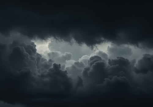 Experience the dramatic beauty of ominous dark storm clouds filling the sky. photo