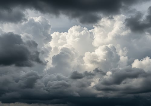 A captivating view of storm clouds with dramatic contrast between light and dark. photo