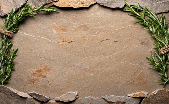 Stone background with rosemary sprigs, perfect for food presentation or product mockups photo