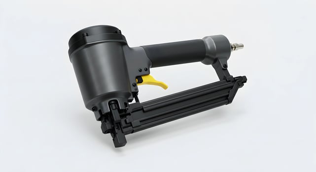 Examining Gray Pneumatic Nail Gun Tool for Carpentry Tasks photo