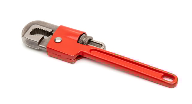 Red Pipe Wrench Tool Isolated on White Background for Plumbing Work photo
