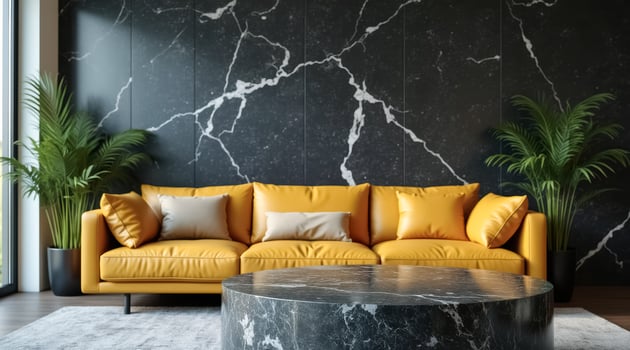 mustard yellow leather sofa against dark marble wall photo