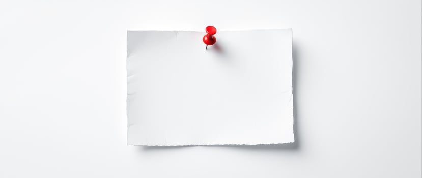 blank white note with red pushpin on white background photo