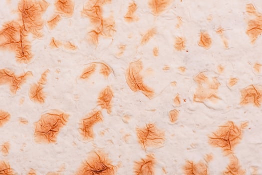 Thin pita bread as a background macro photo. photo