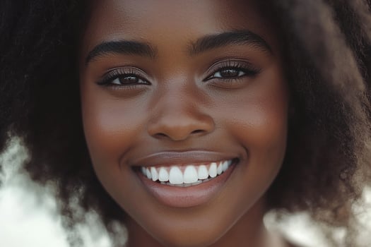 A beautiful young woman with an afro hair smile photo