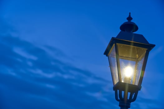 Vintage Street Lamp Glowing at Twilight photo