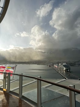 Stormy sky over Ushuaia port with cruise ship photo