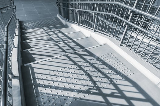 Public stairs and ramp, stair way with step safety dot mark for disability in modern city photo