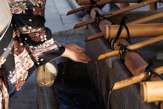 A woman is washing her hands photo
