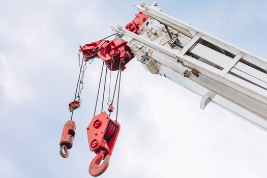 Closeup Hoist Crane hook head for lifting heavy duty, Construction machine arm in the sky. photo