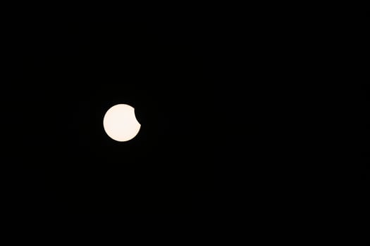 Early Beginning of Partial Solar Eclipse in the Sky from Kollund DK in March 2025 photo