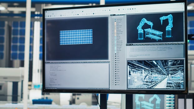 Research and development office in manufacturing plant used to study solar energy systems. Display on desk in empty factory used to improve efficiency and innovation photo
