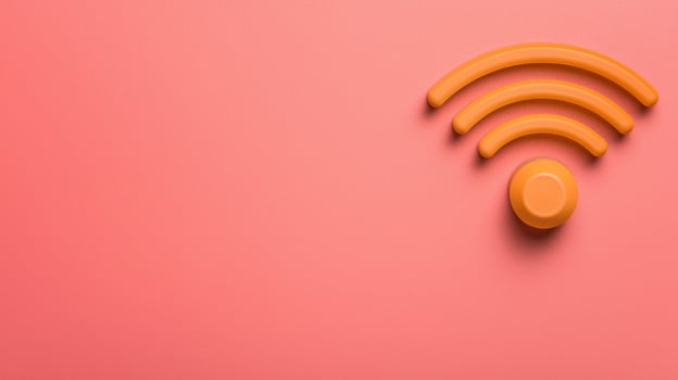 Wireless control sensor frequency icons in vibrant orange create modern and playful design against soft pink background photo