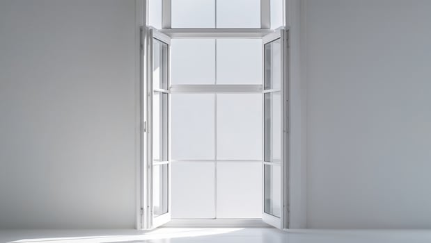 An empty room with a white wall and a window photo