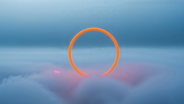 Orange Neon Ring in Blue Foggy Landscape photo