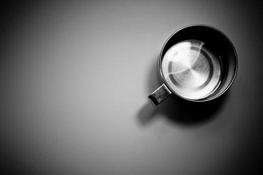 Water in a stainless steel cup photo