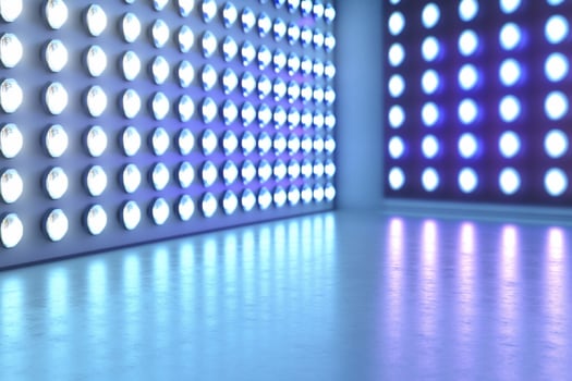 A brightly lit room with blue and white circular lights on the walls. photo