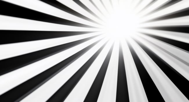 Abstract image with radiating black and white stripes converging to light. photo