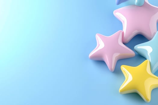 Colorful star-shaped decorations on a soft blue background. photo