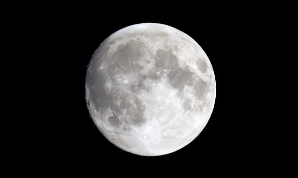 A detailed view of the moon showcasing its surface features. photo