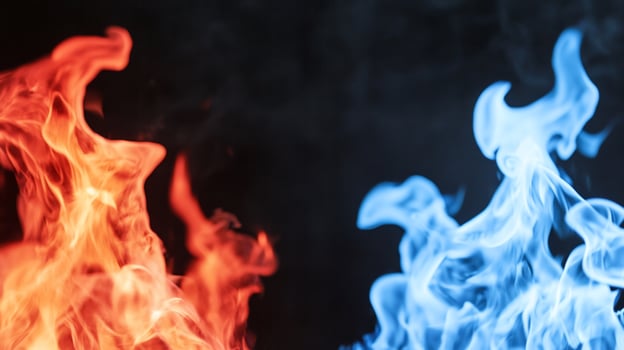 A visual representation of contrasting flames in red and blue colors. photo