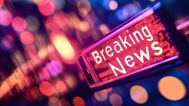 Breaking news sign displaying on abstract background photo
