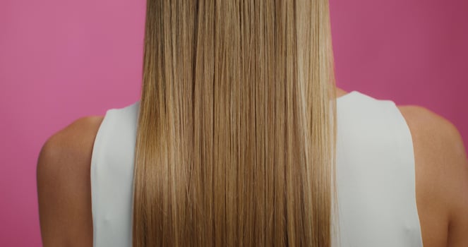 A woman with long, straight hair photo