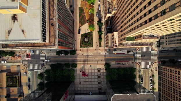 A bird's-eye view of an American city street. The drone flies between the houses. photo