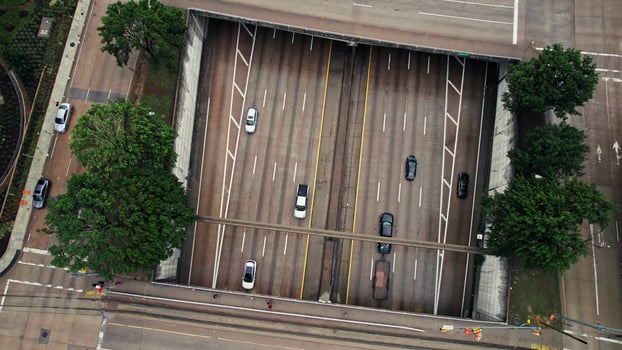 Bird's-eye view of the highway. Heavy traffic on the road. Drone photo