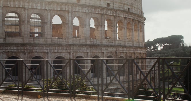 The Coliseum on a sunny warm day. Italy tourist attraction, Rome. Many tourists at the foot of the monument of architecture. in 4k, red komodo photo