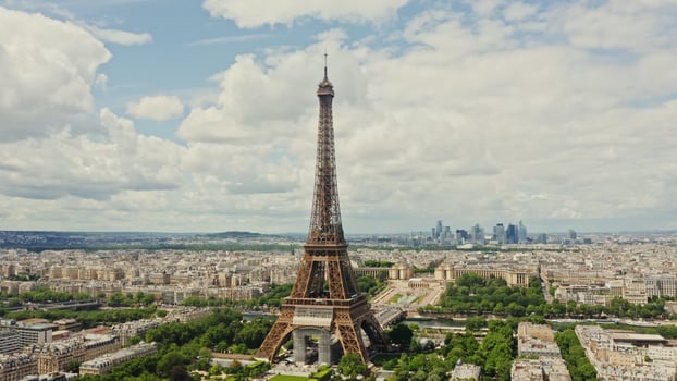 Close up of the Eiffel Tower during restoration. Bird's eye view from a drone on a cloudy day, Paris, France photo
