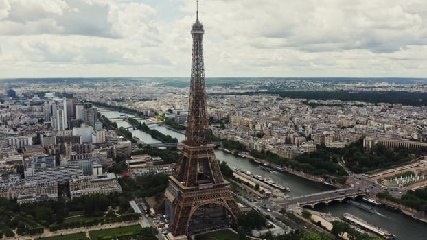 General view of the historic center of Paris with the Eiffel Tower and the river Seine on a cloudy summer day. Drone bird's eye view , France, Paris photo