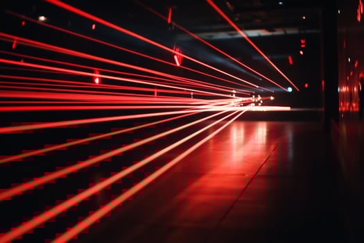 Red light streaks in a dark tunnel photo