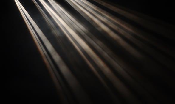 Light beams illuminating darkness photo
