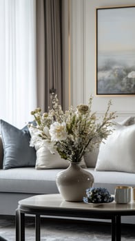 A white vase with flowers on it photo