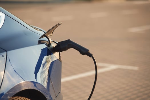 Close up view ,of the modern electric car that is charging photo