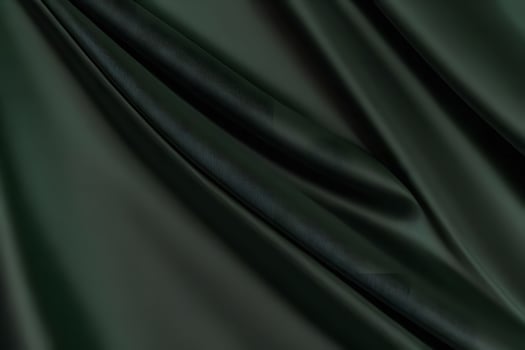Deep Emerald Green Silk Fabric Drape Luxurious Texture and Sophisticated Style photo