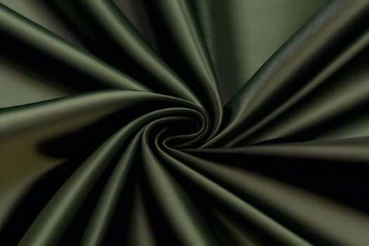 Elegant Dark Green Satin Fabric Swirls Luxurious Texture for backgroundfor backgroundand Deep Color photo